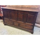 MULE CHEST, George II, oak and mahogany cross banded, with hinged top and three drawers,