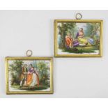 18th CENTURY CONTINENTAL PAINTED PORCELAIN PLAQUES, a pair, in original gilt metal mount,