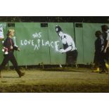 'I LOVE THIS PLACE' graffiti by Banksy photographed at Glastonbury,