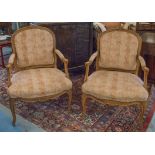 FAUTEUILS, a pair, French Louis XV style beech and spot patterned upholstery.