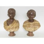 A PAIR OF ANTIQUE PORPHRY AND ONYX CARVED BUSTS, of a boy and girl, Italian, 19th century,