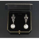 A PAIR OF SOUTH SEA CULTURED PEARL AND DIAMOND PENDANT EARRINGS, mounted in white gold,