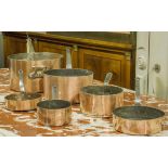 BATTERIE DE CUISINE, vintage, a matched graduated set of six, copper iron handled pans,