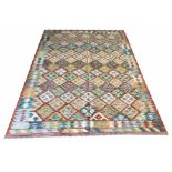 ANATOLIAN KILIM, 230cm x 166cm, in a fusion of contemporary colour.