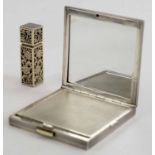 AN ART DECO FRENCH SILVER & GOLD COMPACT, with matching lipstick holder, possibly Boucheron,