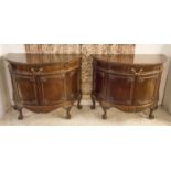 DEMI LUNE SIDE CABINETS, a pair, early 20th century George III style mahogany,