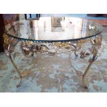 LOW TABLE, mid 20th century foliate gilt metal with circular glass top, 76cm diam x 43cm H.
