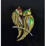 NICOLETTI MILAN 1960's, an amusing eighteen carat gold diamond ruby and enamel two love bird brooch,