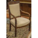 FAUTEUILS, a pair, 19th century French Charles X mahogany each upholstered in fine studded linen,