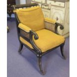 JULIAN CHICHESTER LIBRARY BERGERE, model 'Norfolk' Regency style ebonised and gilt frame,