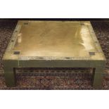 LOW TABLE BY DUBARRY, square etched brass on block supports signed R Dubarry,