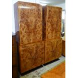 TALL CABINETS, a pair, by Restall Brown and Clennell burr walnut each with a brushing slide,