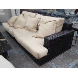 RALPH LAUREN HOME SOFA, rattan and ebonised wood with duck down cushions, 250cm W (slight faults).