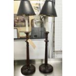 TABLE LAMPS, a pair, turned wooden stems with metal tole shades in a bronzed finish, 78cm H.