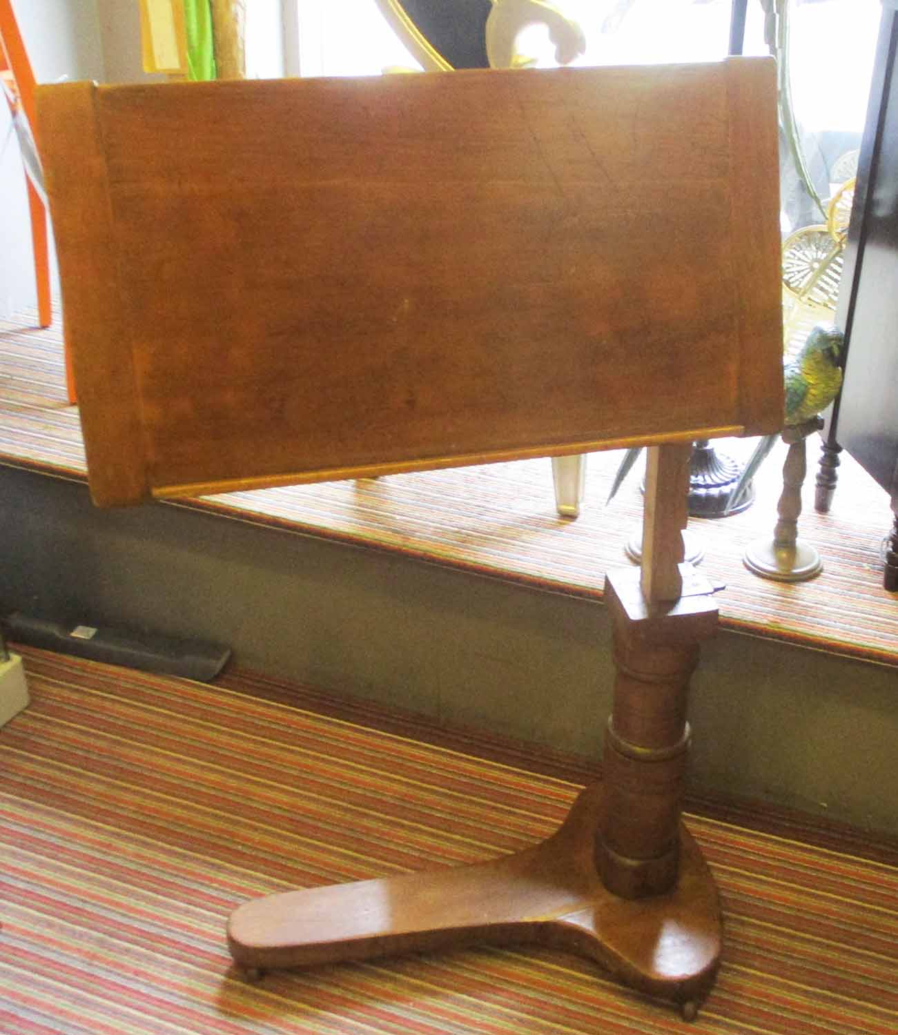 READING TABLE, Victorian fruitwood adjustable on castors, 75cm x 125cm H.