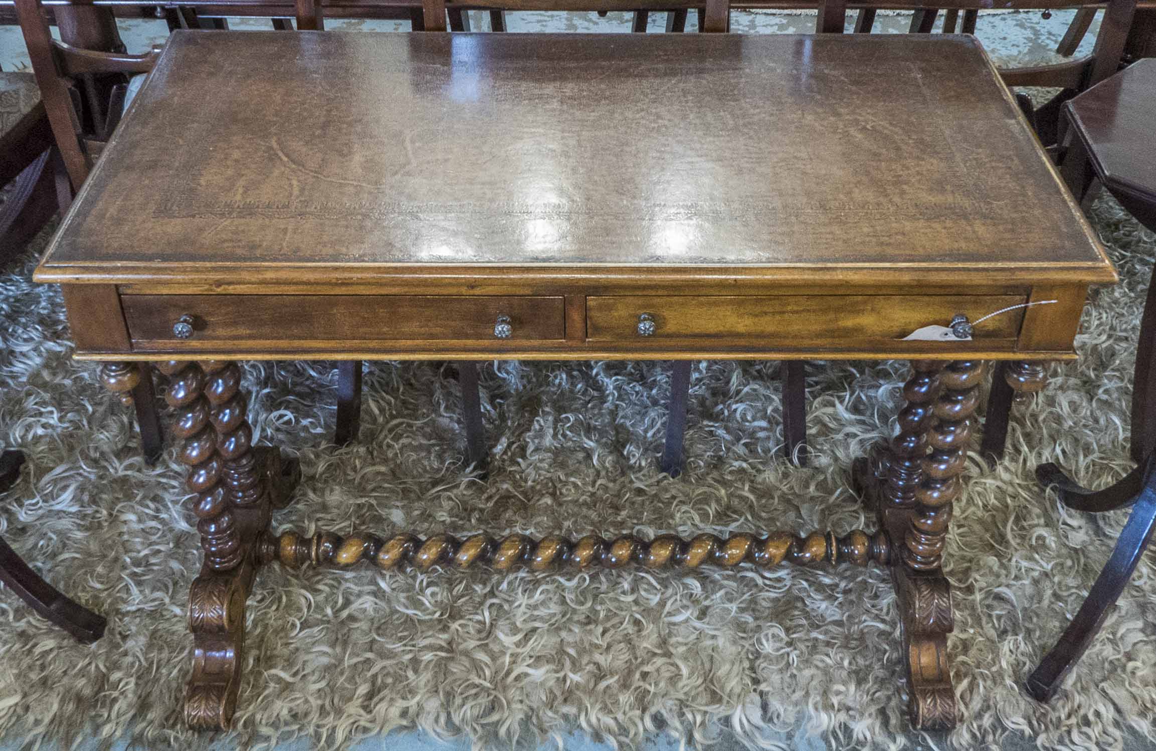 THEODORE ALEXANDER WRITING TABLE, Victorian style with an inlaid leather top,