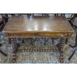 THEODORE ALEXANDER WRITING TABLE, Victorian style with an inlaid leather top,