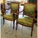 FAUTEUILS, a pair, early 19th century French Charles X mahogany with Empire green silk upholstery.