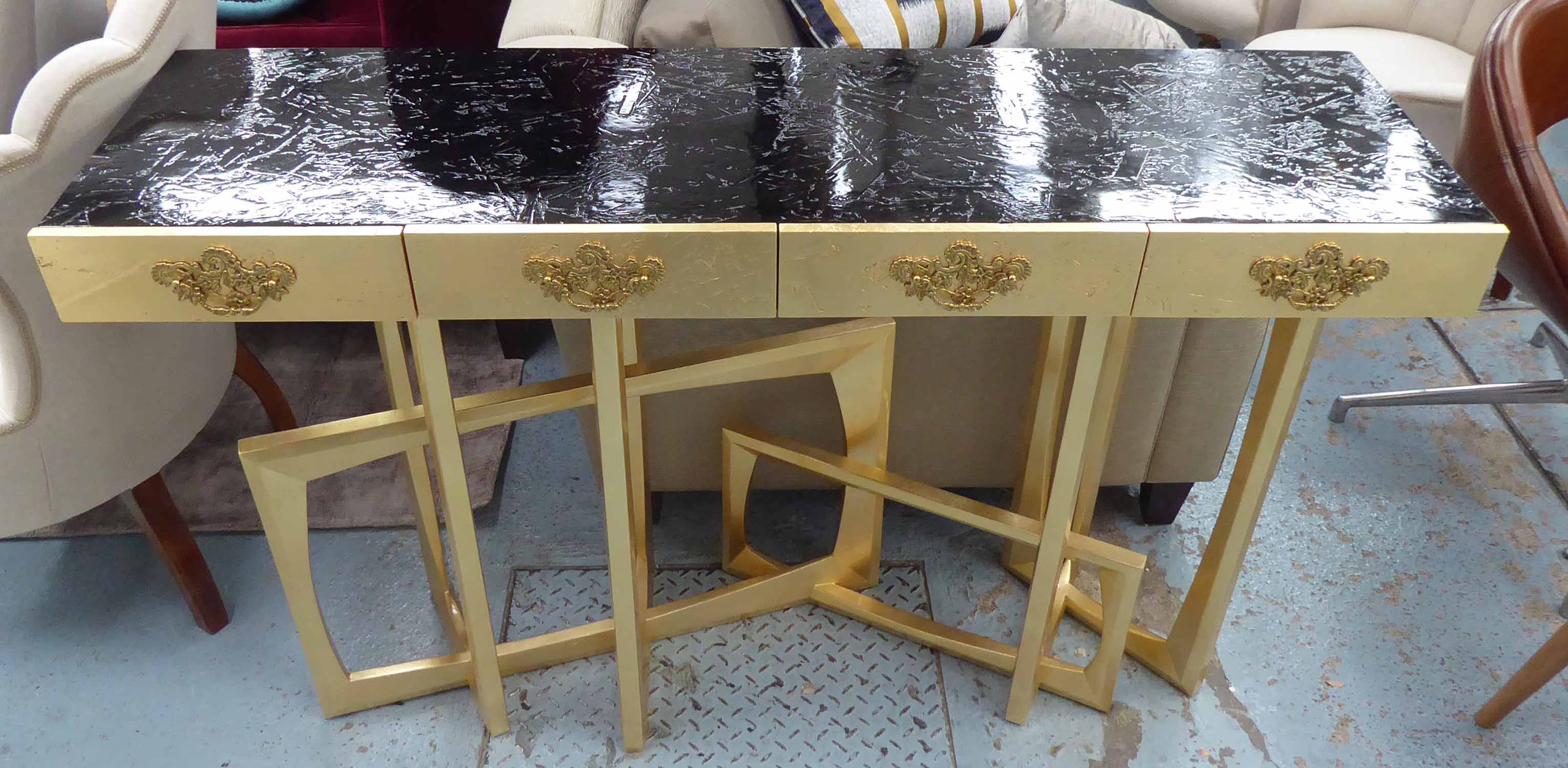 CONSOLE TABLE, contemporary, gold leaf and ebonised finish, 86cm H x 140cm W x 41cm D.