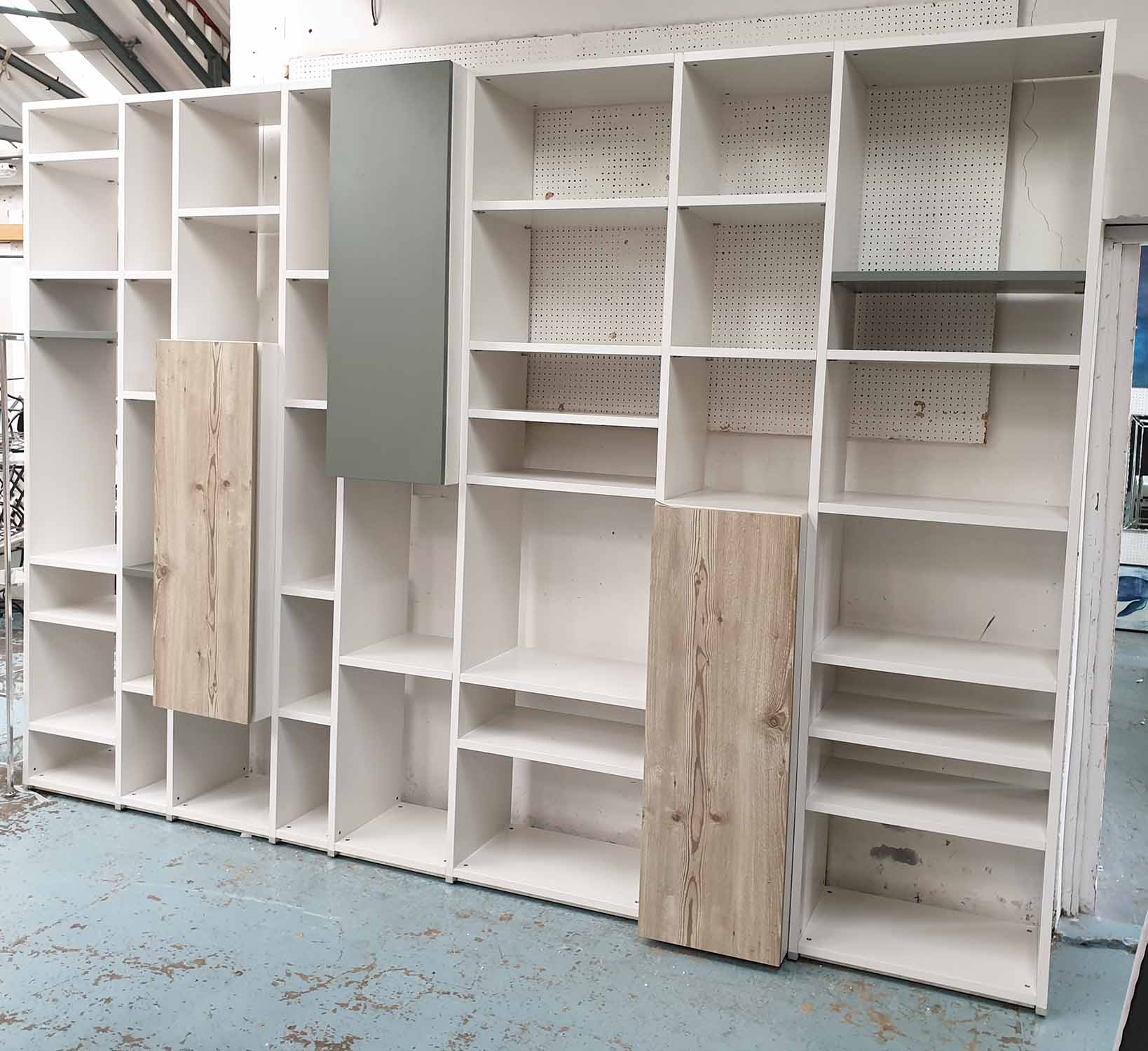 BOOKCASE, contemporary of large proportions, laminate with oak detail, 340cm W x 40cm D x 243cm H.