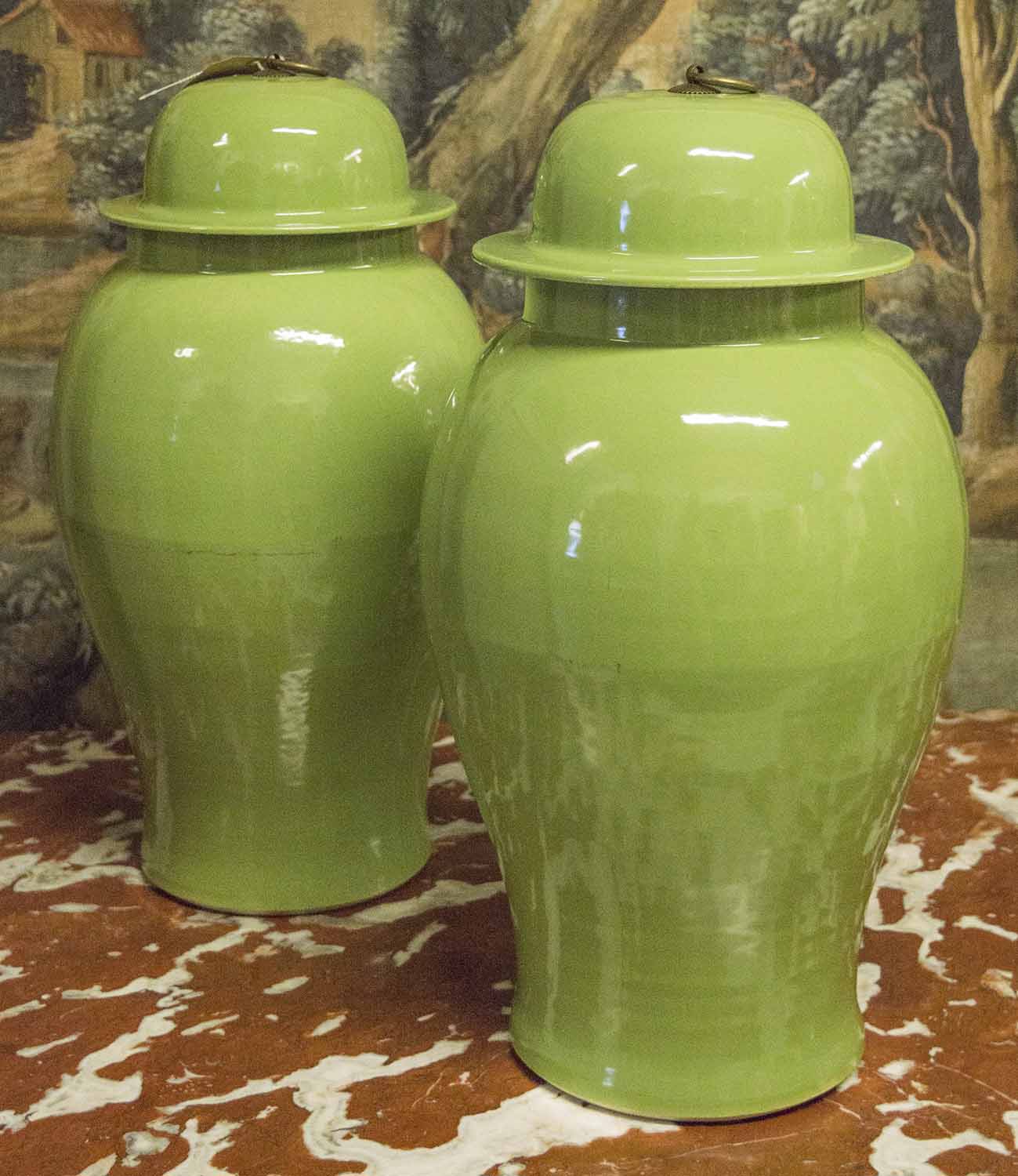 TEMPLE JARS, a set of four, Chinese ceramic ginger jar form in leaf green, 53cm H.