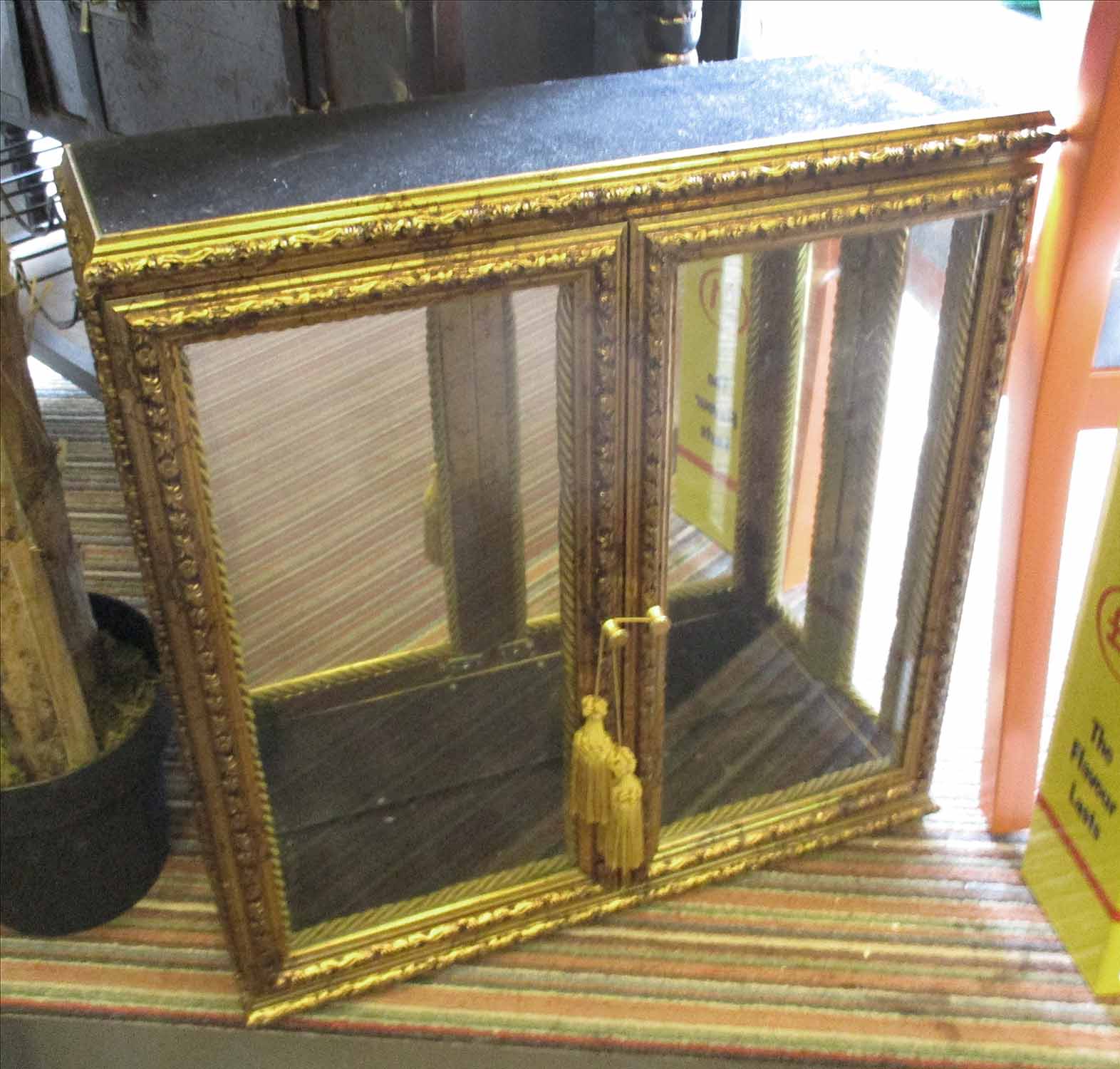 GLAZED DISPLAY CABINET, in a gilded finish, 54cm x 14cm x 56cm H.