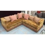 CORNER SOFA, mustard velvet with polychrome bullion fringe and nine patterned loose cushions,