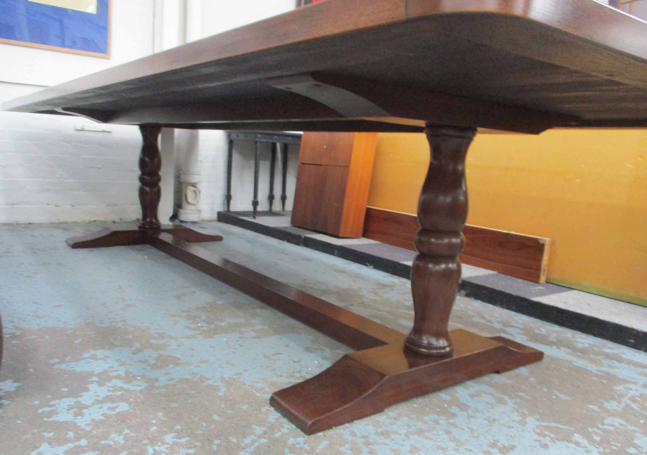 DINING TABLE, walnut of large proportions on baluster turned trestle supports joined by a stretcher, - Image 4 of 5