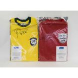 FOOTBALL SHIRTS, signed Pele and Geoff Hirst.