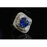 A FINE SAPPHIRE AND DIAMOND CLUSTER RING,