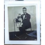 LOUIS ARMSTRONG, black and white silver gelatin print, signed, dedicated and dated 1934,