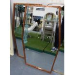 WALL MIRRORS, a pair, 1960's Italian style, coppered finish.