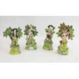 FOUR EARLY 19TH CENTURY STAFFORDSHIRE FIGURES, three impressed Walton on reverse, 14cm H.