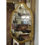 WALL MIRRORS, a pair, 19th century Continental giltwood and gesso,