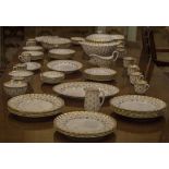 DINNER SERVICE, English fine bone china by Spode fleur de lys gold, twelve place,