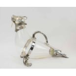 UNUSUAL CLARET JUG, silver plated and glass, designed as a walrus, 35cm Long x 27cm H.
