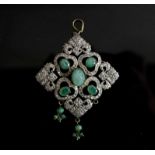 A VINTAGE EMERALD AND DIAMOND PENDANT, of lozenge shape, probably Persian, 6cm across approx.