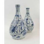 TWO CHINESE WANLI PERIOD VASES (1572-1622), of pearl shape decorated in blue and white 28cm H each.