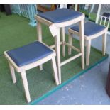 JUSTIN VAN BREDA HORSINGTON STOOLS, a set of three, tallest 85cm H.