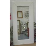 WALL MIRROR, 1970's style, broad laminated white lacquered frame, 190cm W x 95cm H.