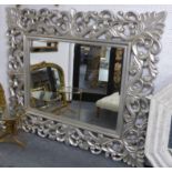 LARGE MIRROR, Rococo style silver painted scrolling decorative pierced frame, 190cm x 156cm.