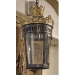 HALL LANTERN, 19th century style patinated and gilt metal with single light and glass panels,