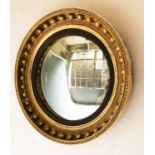 CONVEX WALL MIRROR, Regency giltwood and gilt composition,