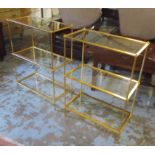 ETAGERES, a pair, gilt metal framed, three tier, each with a rectangular glass top,
