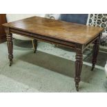 CENTRE TABLE, Victorian mahogany circa 1840 with rectangular top on reeded legs and brass castors,
