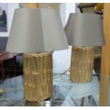 SIDE LAMPS, a pair, with gilt metal bases with a swagged design, 71cm H including shade.