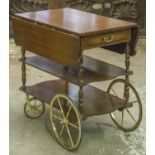 DRINKS TROLLEY, mahogany of three tiers with drop flaps and single drawer, 75cm H x 49cm x 84cm,