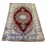 TURKISH PURE SILK RUG, 180cm x 119cm, floral medallion within multiple corresponding borders.