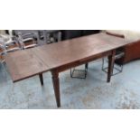 DINING TABLE, extending (two leaves) in stained oak on square supports,