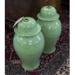 TEMPLE JARS, a pair, Chinese leaf green ceramic ginger jar form with lids, 53cm H.